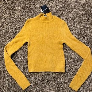 Cropped turtle neck sweater
